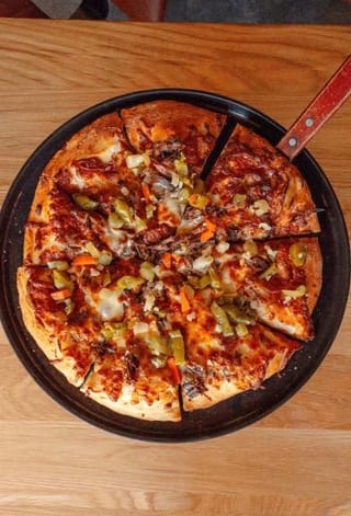 Braised Short Rib pizza with chopped vegetable relish